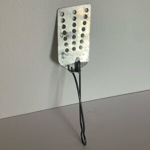 Vintage squeeze Metal Flipper Kitchen Tool.Approx,  2 1/2 wide and 10 3/4 long